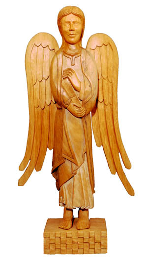 Sculpture d'un ange tenant un livre dans ses mains